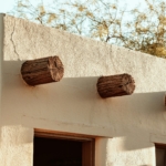 Exterior building structure of an adobe desert house.