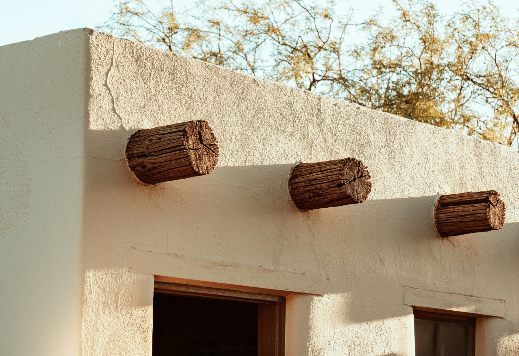 Exterior building structure of an adobe desert house.